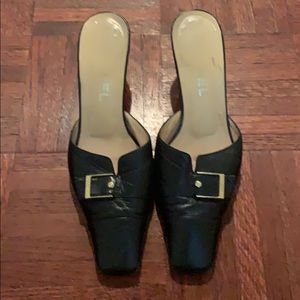 Chanel black leather heeled slides